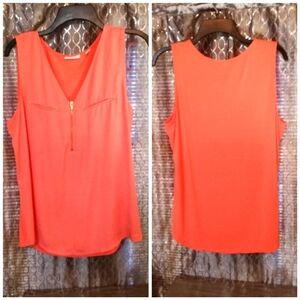 NWOT New York & Company stretch large coral blouse. Never worn. Stretchy back fl